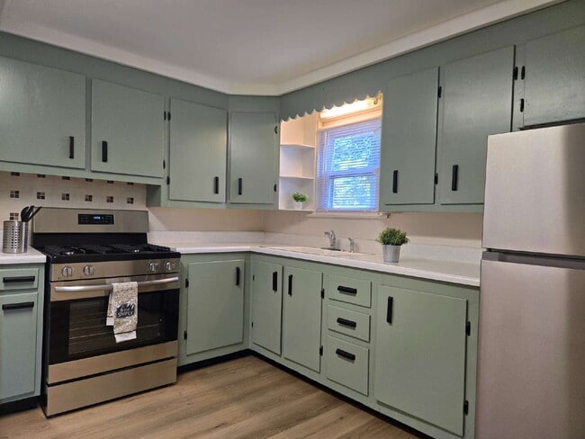 Building Photo - Room to Roam — Updated 2 Bed with Huge Yard & 2-Car Garage
