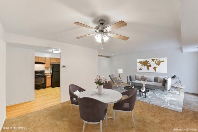 Separate Dining Area with Lighted Ceiling Fan - The Forest Apartments