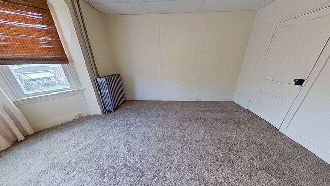 Building Photo - Second-Floor Apartment with Upgrades!