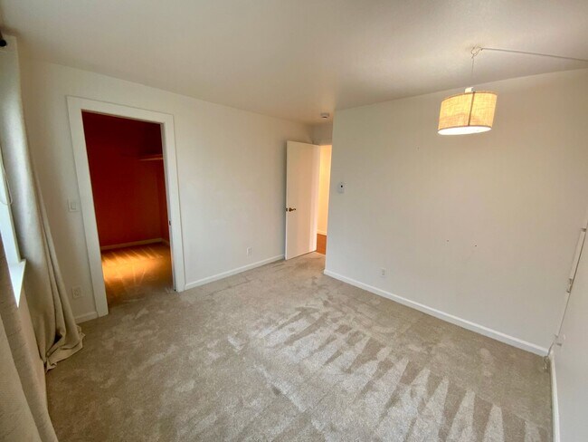 Building Photo - 1,300+ Sq Ft 2BR Condo w/ Parking, W/D & Utilities Included | $1,000 Move-In Credit