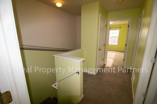 Building Photo - Forest Hills 3 Bed Townhome with Garage, Pond View and Some Utilities Included