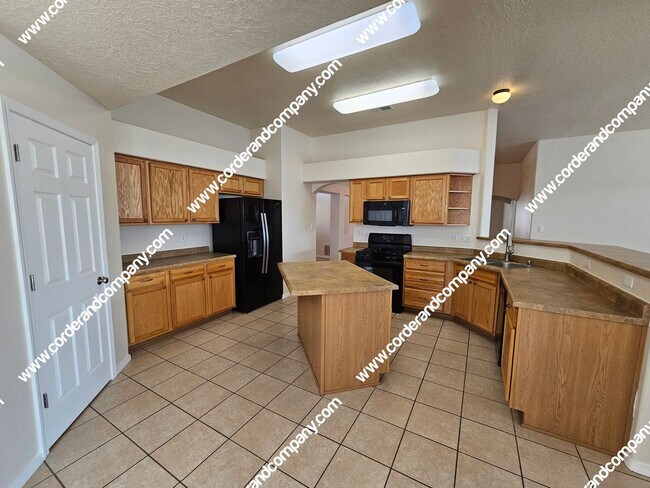 Building Photo - Custom 3 Bedroom, 2 Bathrooms, 2 Car Garage and 2,212 Sq Ft. Home with Beautiful Sandia Mountain ...