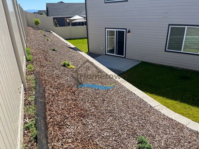 Building Photo - Woodbridge South Home with 4 Bedrooms and 3 Bathrooms in Post Falls build in 2021!