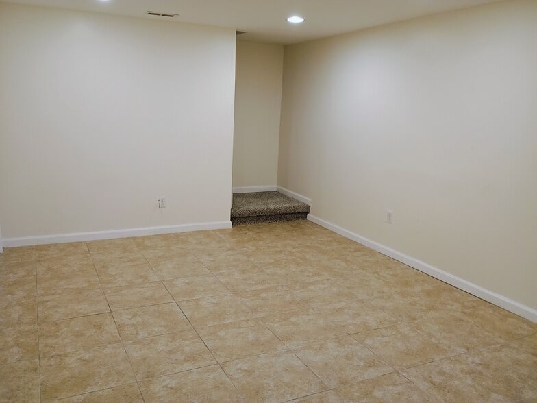 Basement Family Room - 10360 E Jewell Ave