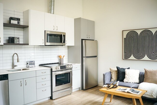 Building Photo - Spring Specials: Sleek & Modern Studio w/Condo-Grade Finishes + Patio!