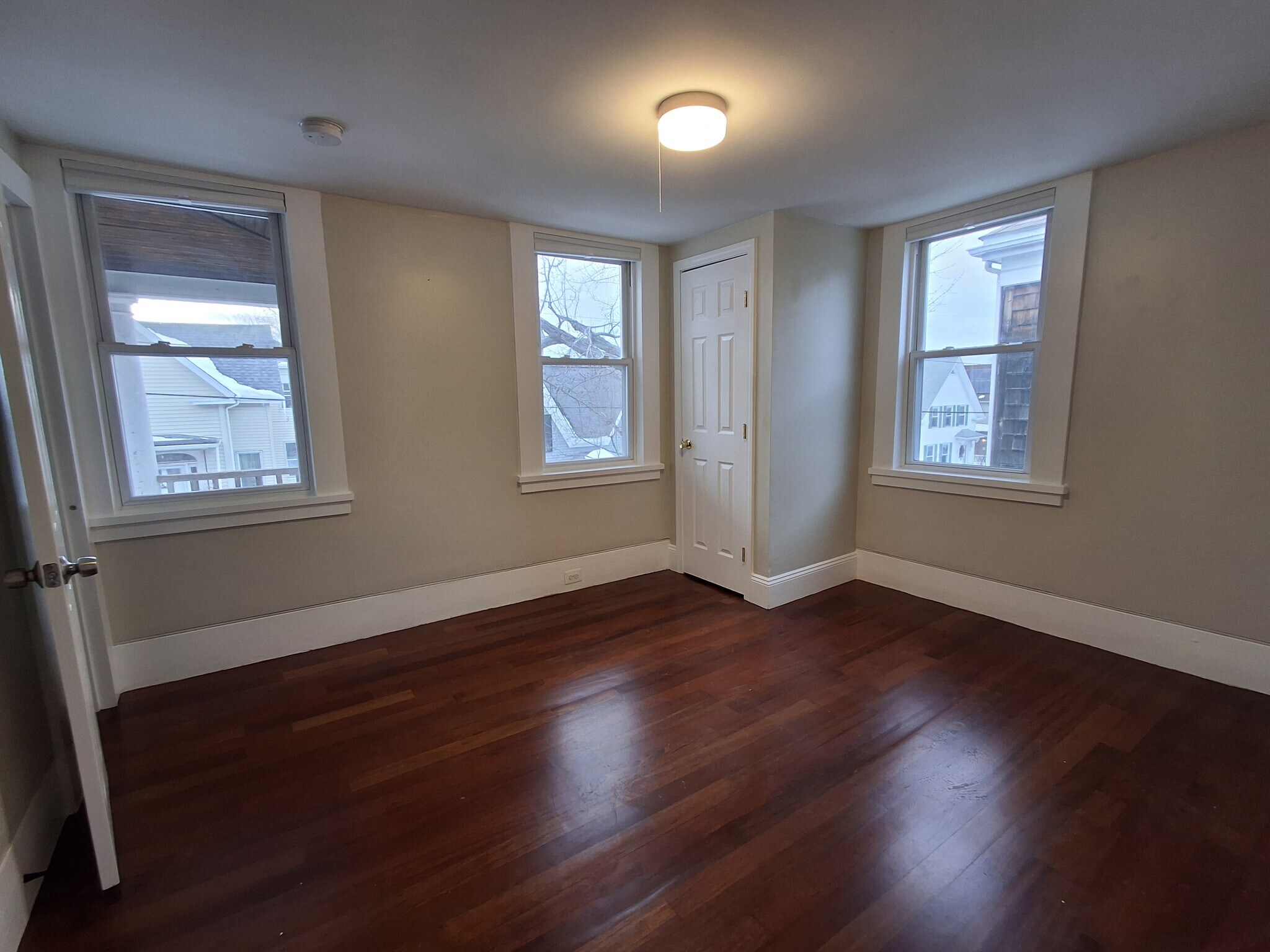 Primary Bedroom: Newly refinished cherry hardwood flooring. - 13 Mulberry St