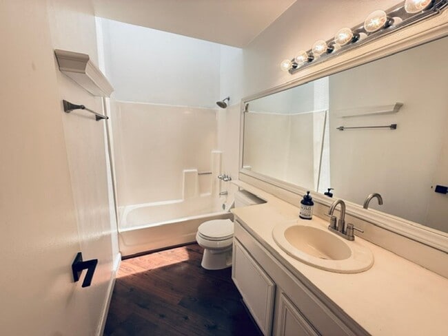 Building Photo - Spacious 3 Bedroom 3 Bath Condo with Garage in Desirable Highland Trails Community