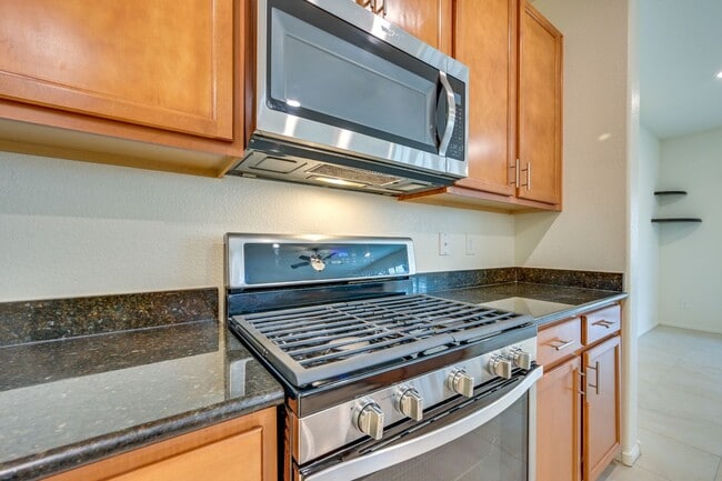 Building Photo - Green Valley!! Gated!! 4 Bedrooms!! Bed & Bath Downstairs!!  TANKLESS WATER HEATER!!! Covered pat...