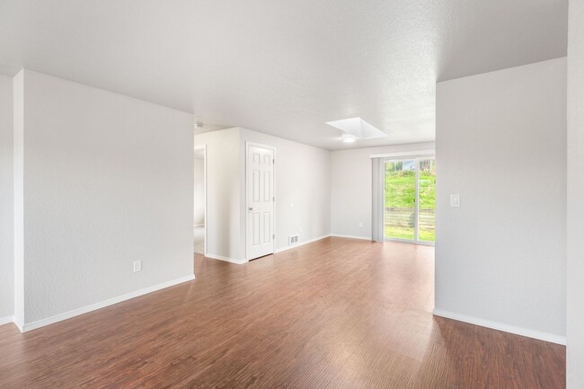 Building Photo - Recently updated 3 bdrm, 2 bath. Attached garage. Wrap around yard. Private upstairs bedroom and ...