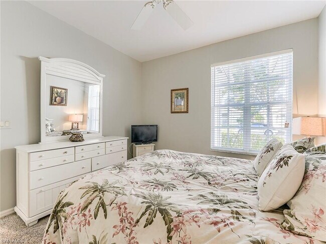 Building Photo - Turnkey 2-bedroom plus den villa, perfectly situated to capture stunning golf course and lake vie...