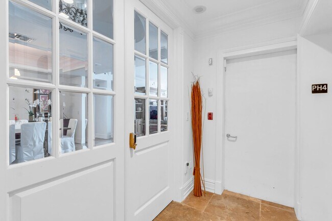 Building Photo - Step into luxury with this fully furnished PH offering stunning ocean and bay views. Located in t...