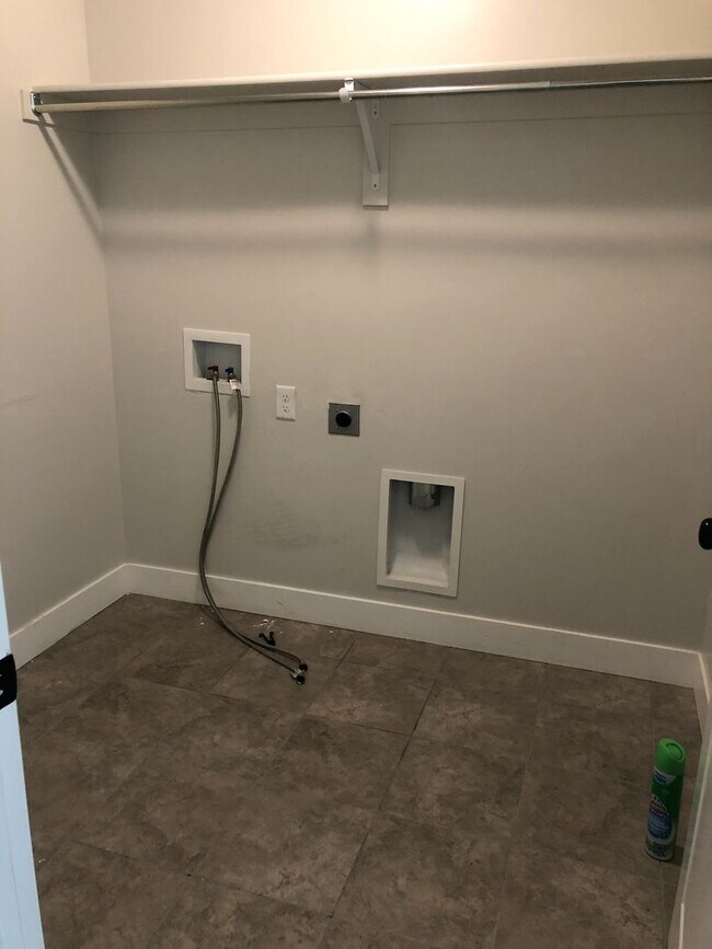 Building Photo - AMAZING HOME IN SOUGHT AFTER EXCHANGE DEVELOPMENT W/ 2 CAR GARAGE