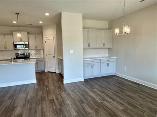 Building Photo - Relax & Unwind in This Peaceful 4 Bedroom ...