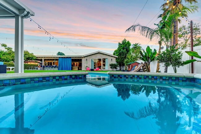 Building Photo - 5817 Ranchito Ave