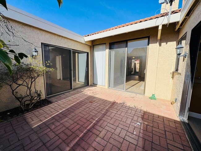 Building Photo - Tastefully updated 2 bedroom/2 bath, single level townhome w/attached 2 car garage!