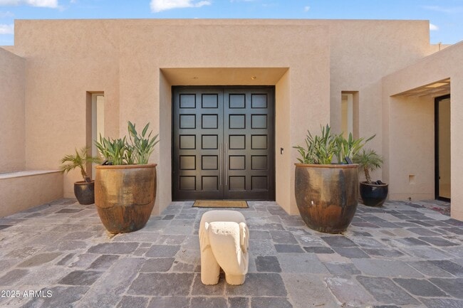 Building Photo - 9191 E Happy Hollow Dr