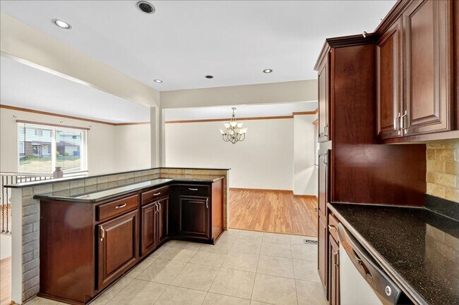 Building Photo - Step inside to experience the charm!
