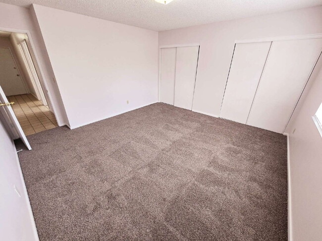 Building Photo - Spacious 4-Bedroom Oasis with Elegant Granite Touches in Vibrant Las Vegas!