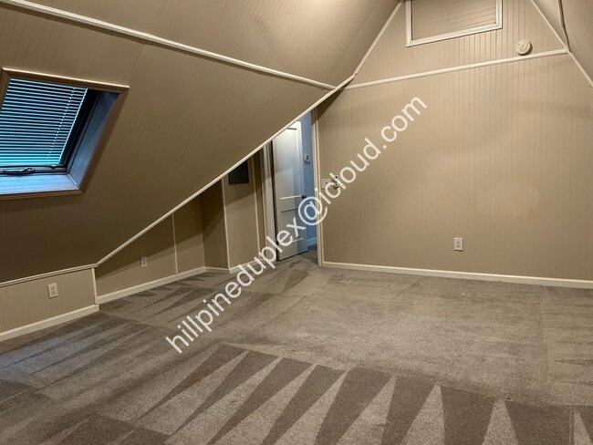 Huge primary bedroom with vaulted ceiling - 629 Hillpine Dr NE
