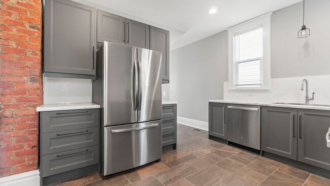 Building Photo - Completely Brand New Restored Historic Townhome near Wells St Corridor.