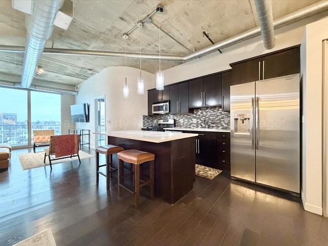 Building Photo - 2BR/2BA Skylofts Condo with Balcony & Garage Parking