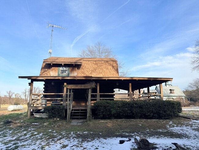 Building Photo - Serene Loft-Style Log Cabin on a Private Acre Near Beaches & Downtown Milford