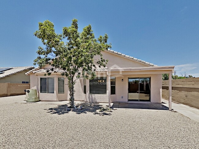 Building Photo - 7547 W Vermont Ave