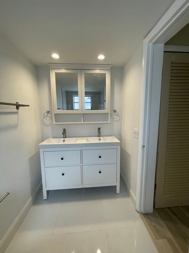 New vanity and mirror - 7426 SW 82nd St