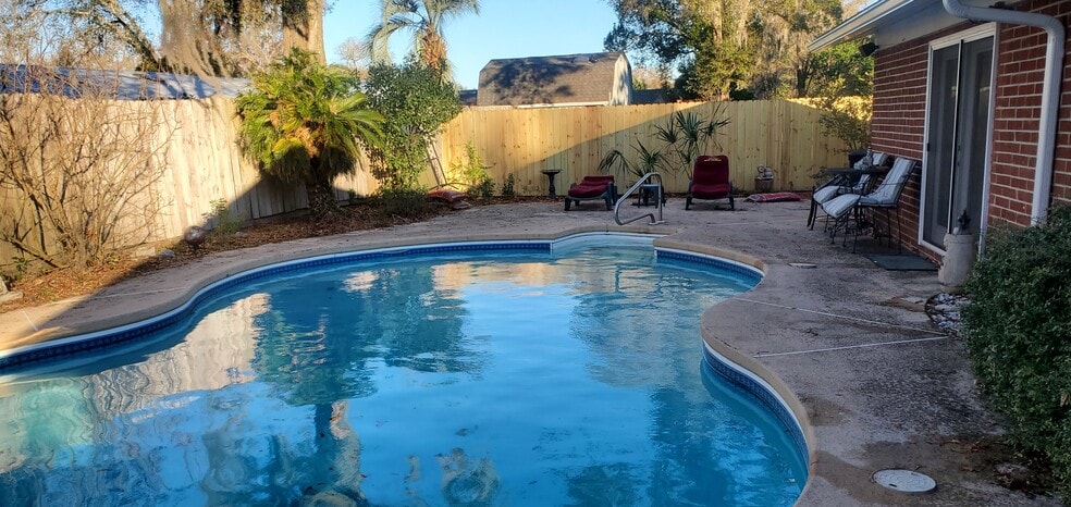 Pool area with new fencing - 2620 Moody Ave