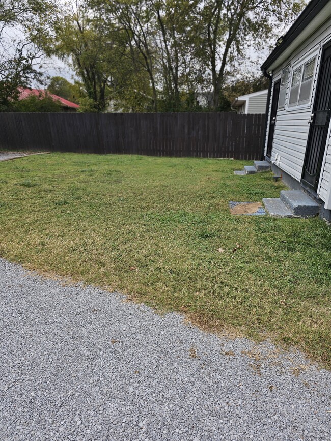 private fenced yard - 127 E Park Ave