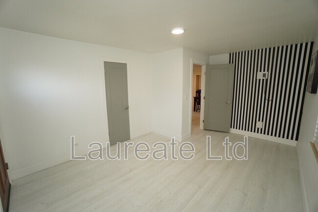Building Photo - 5090 W 36th Ave