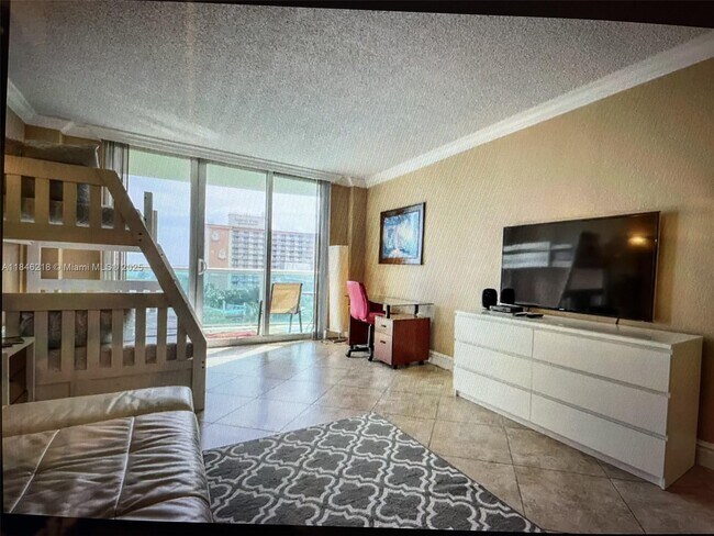 Building Photo - 19370 Collins Ave