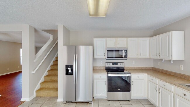 Building Photo - 8139 Deodora Cedar Ln