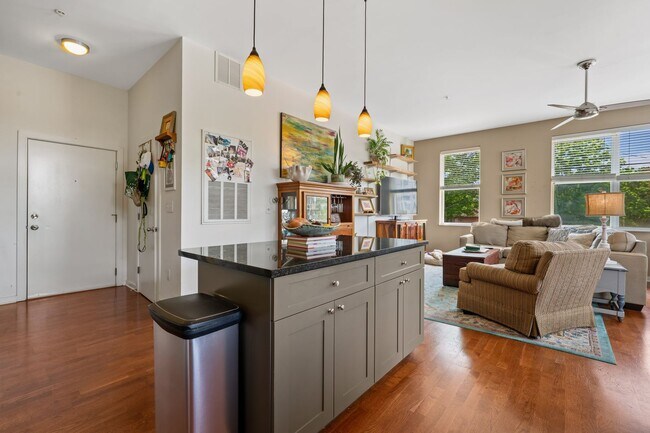 Building Photo - Price Reduced! Downtown Durham 1bd/1ba Corner-Unit Condo with On-Site Personal 1-Car Garage!