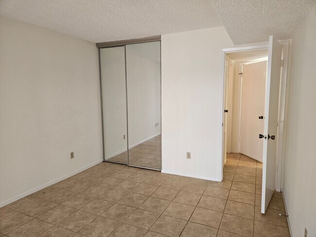 Building Photo - Beautifully Updated 2BR/2BA with Loft Oasis – Safe & Gated Community