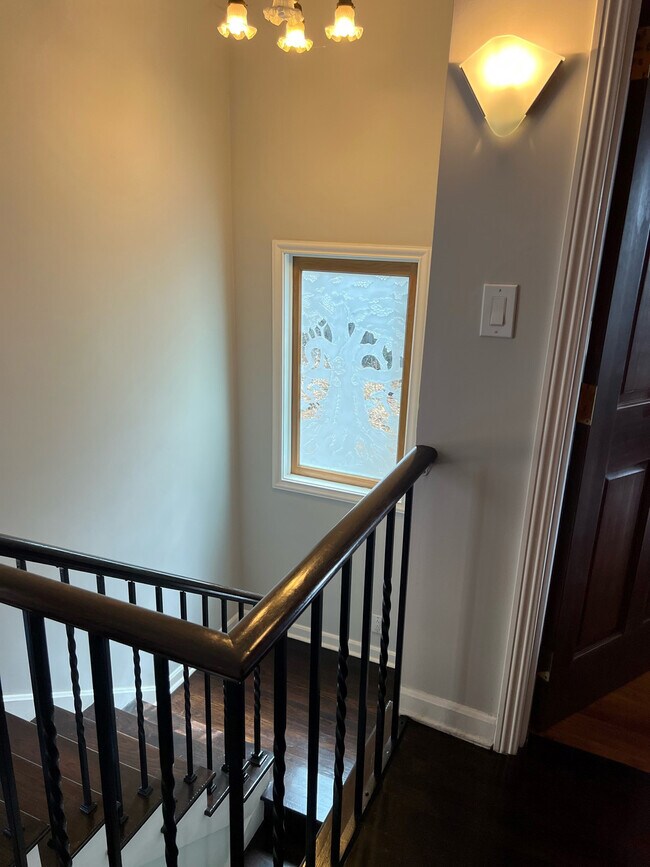 Stairway to 2 master en-suite bed - 6123 Scenic Ave