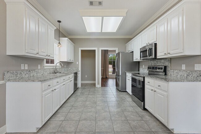 Building Photo - On the Lake!  Large 3 Bedroom with huge fenced back yard