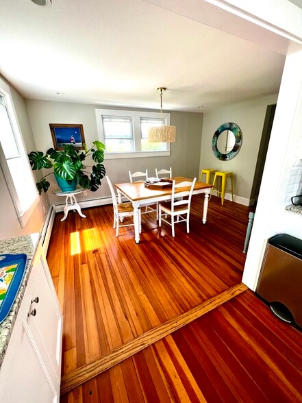 this table is now on the front porch and a beautiful large marble table is in dining room with8chair - 46 Crescent Ave