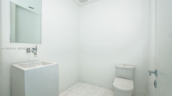 Building Photo - 19575 Collins Av