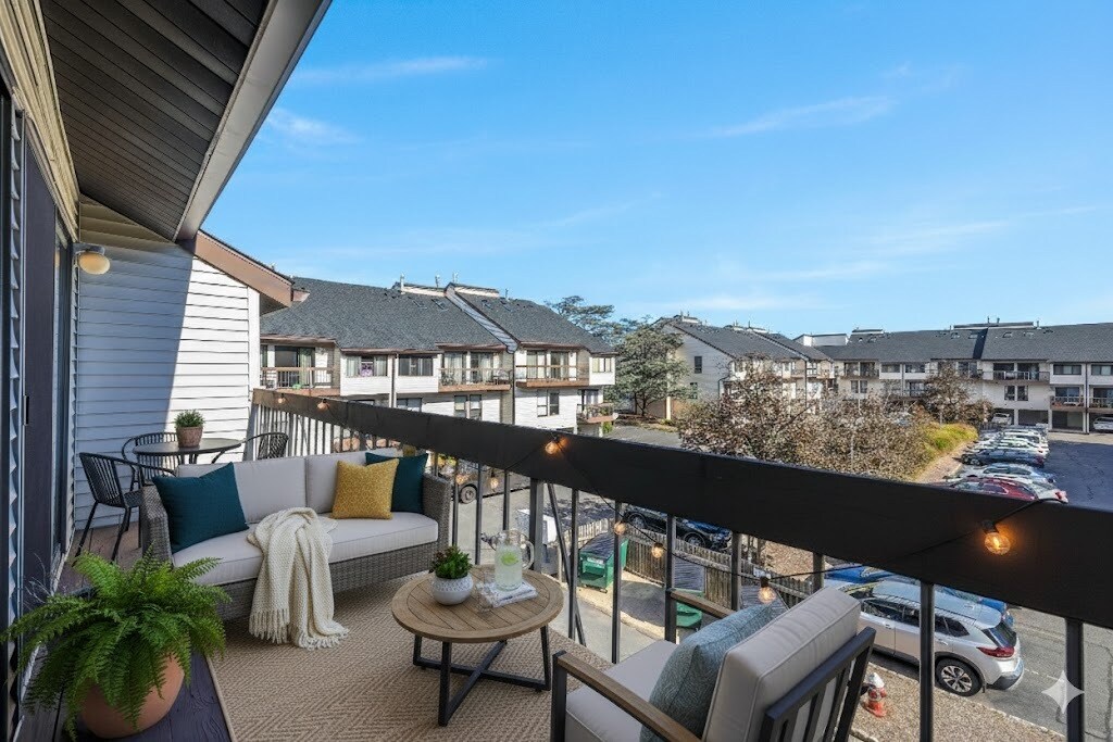 Relaxing outdoor patio, perfect for entertaining or enjoying quiet moments. - 3320 Richmond Ct