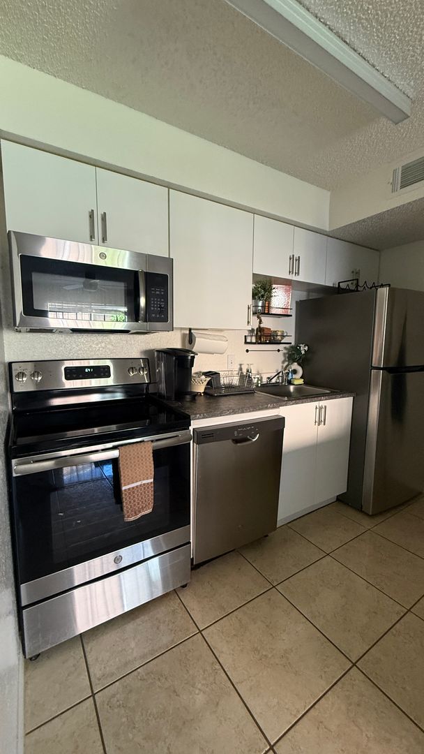 Building Photo - Charming 1bed 1bath Condo in Kissimmee