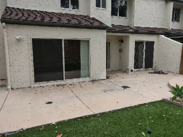 backyard facing house - 10709 Portobelo Dr