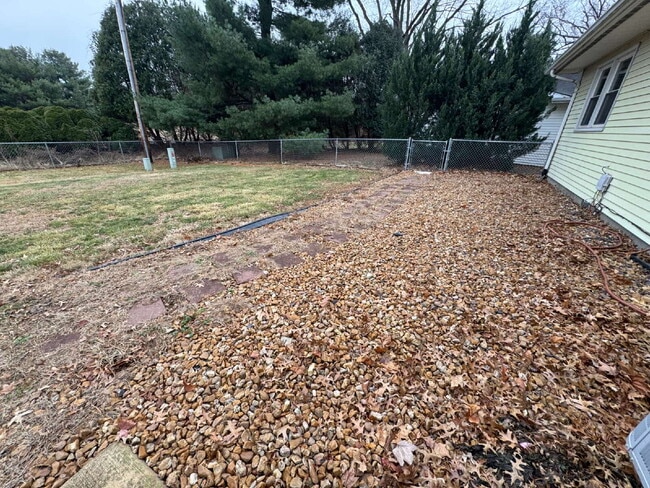 Building Photo - “Spread Out!” — 3 Bed Home with Sun Room + Multiple Living Spaces