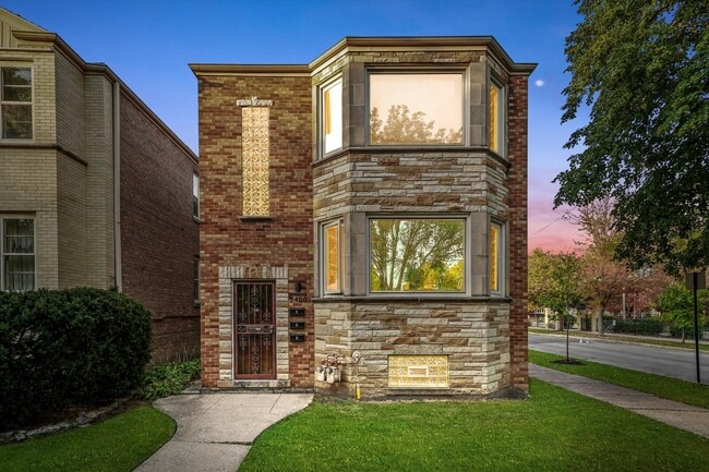 Building Photo - 5400 W Berteau Ave