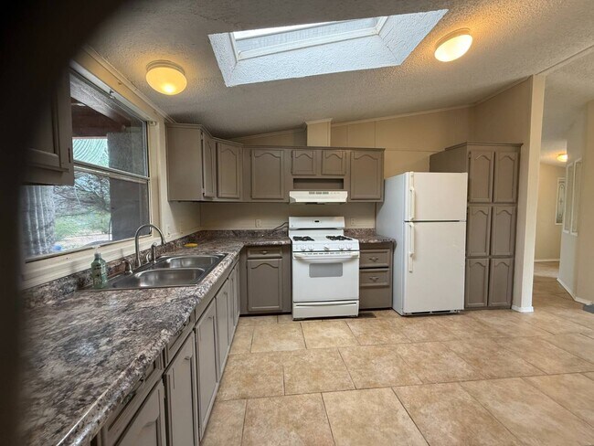 Building Photo - 6575 N Pelto Path