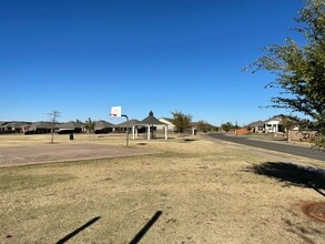 Building Photo - Neighborhood pond, playground, walking tra...