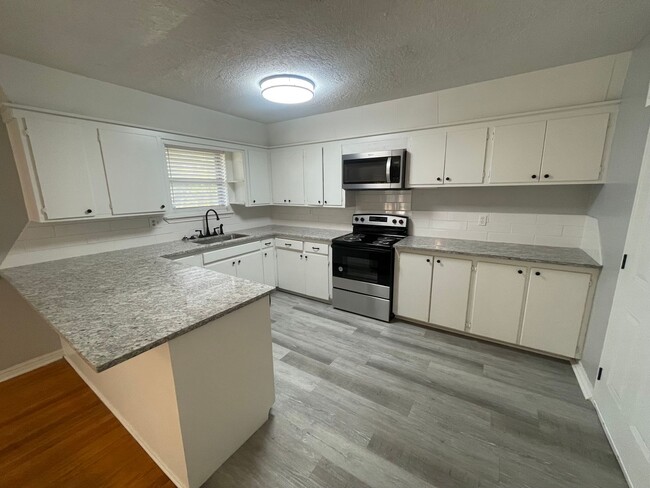 Building Photo - 200 off your move in by 2/15!  Available N...