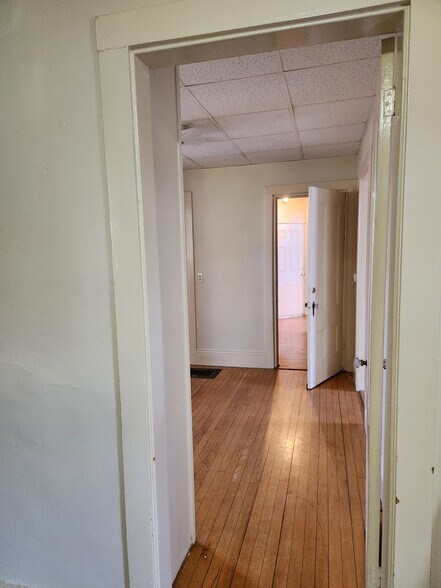 Looking back toward the front door from the kitchen - 46 Saunders St