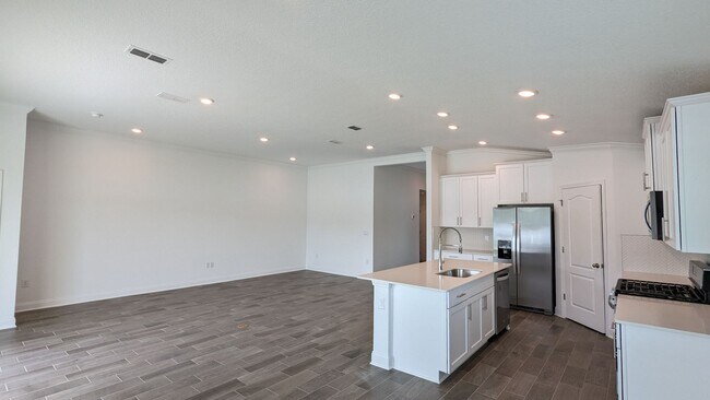 Building Photo - PREMIUM FINISHES AND POND VIEW!!  A PREMIU...