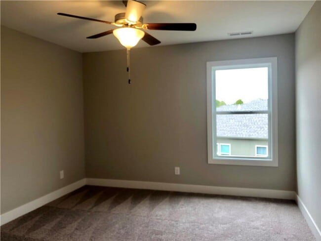 Building Photo - COMING SOON: Modern 3-Bedroom Townhome wit...